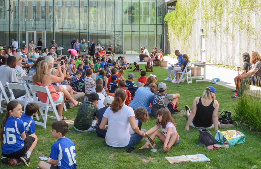 People gathered at library event