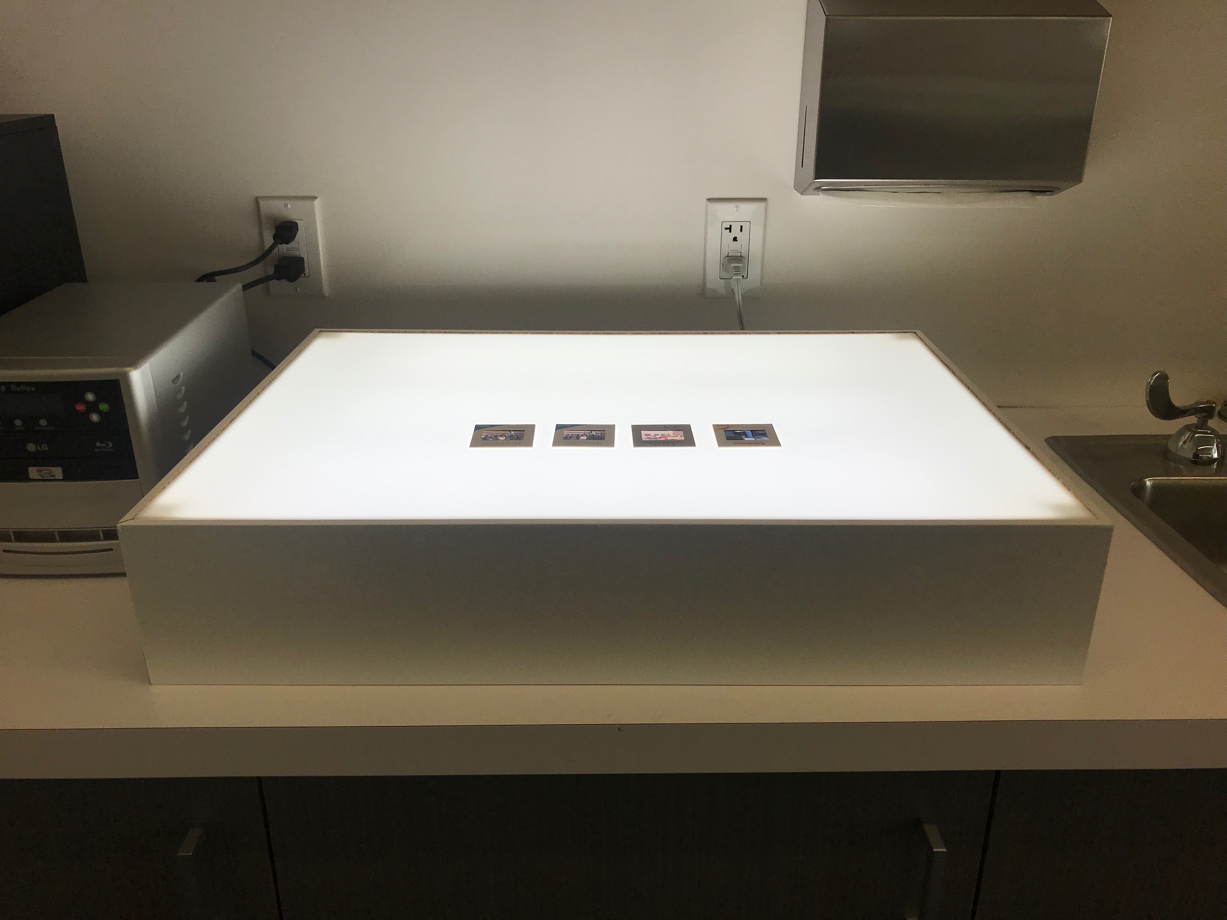 Light box with 4 slides on it