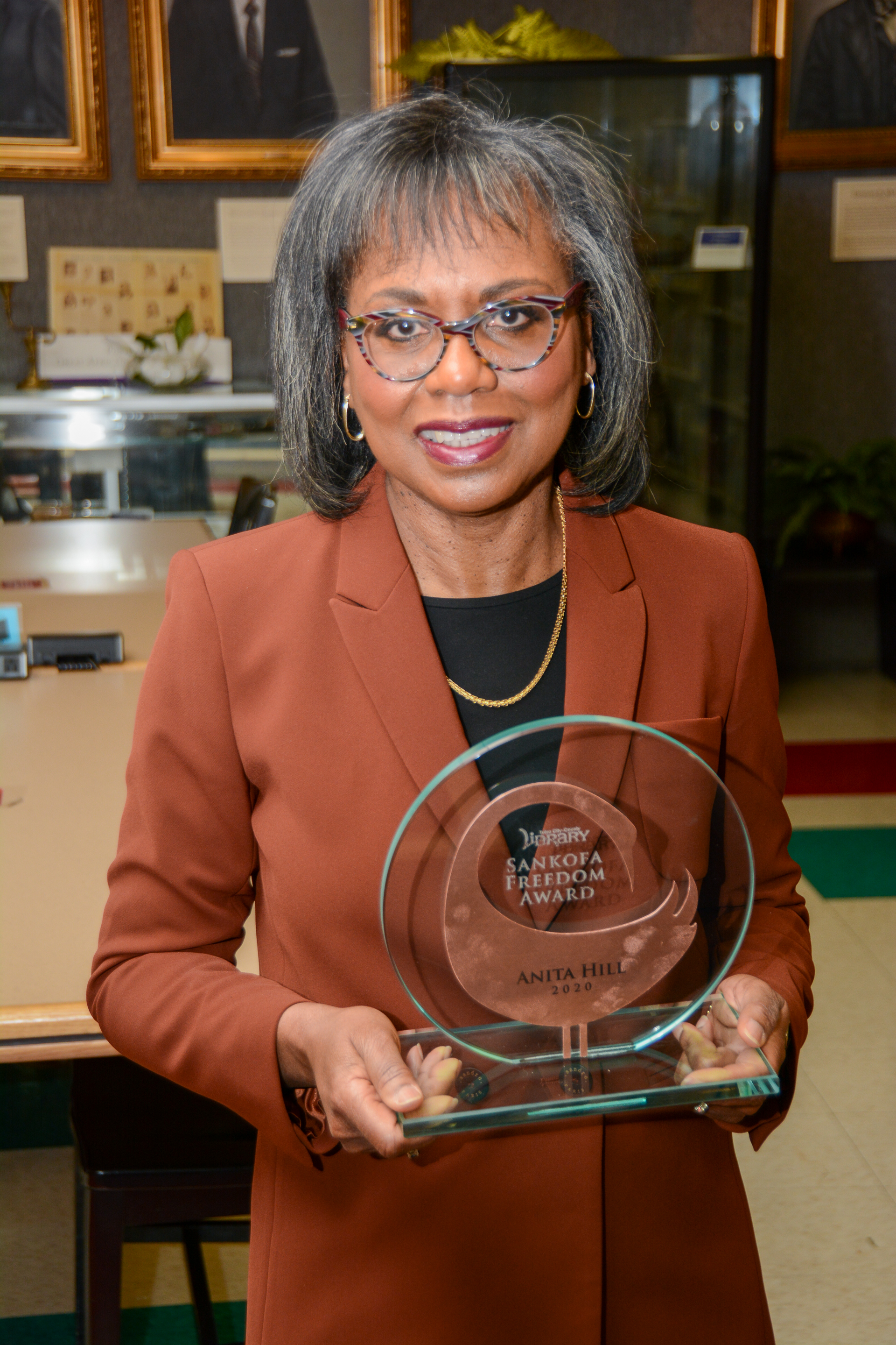 Anita Hill holding the Sankofa Freedom Award