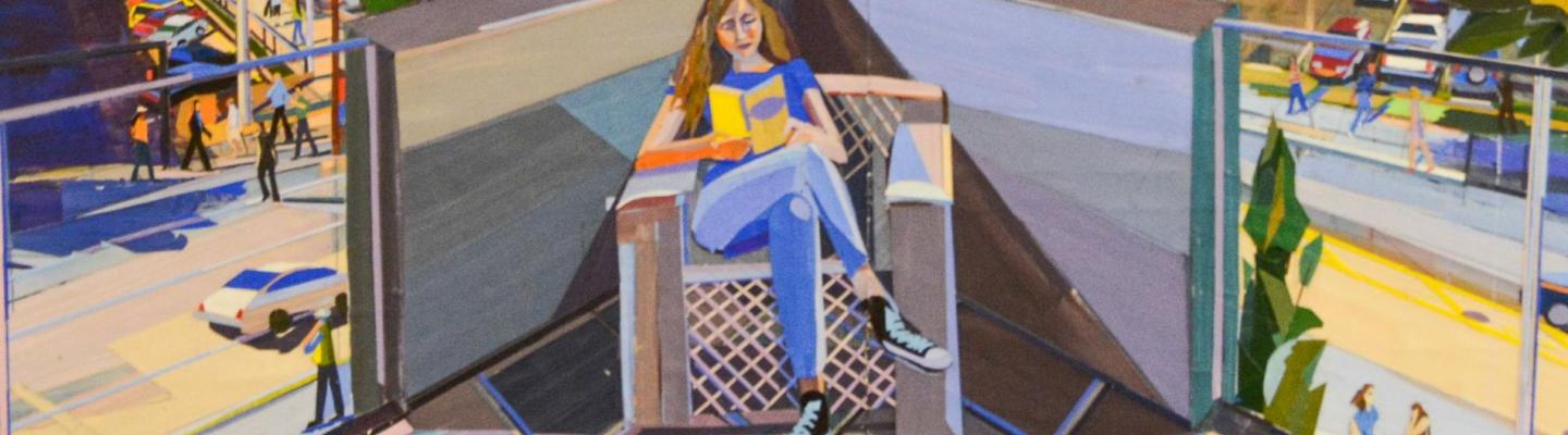 woman reading a book on the balcony of the library
