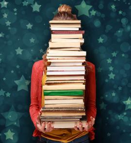 Person carrying a stack of books.