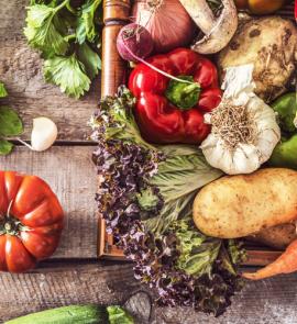 Fresh vegetables on a cutting board.