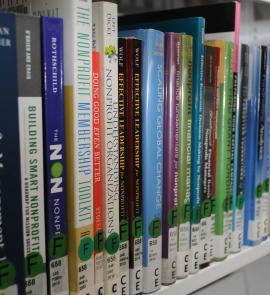 diagonal view of a row of nonprofit books about management