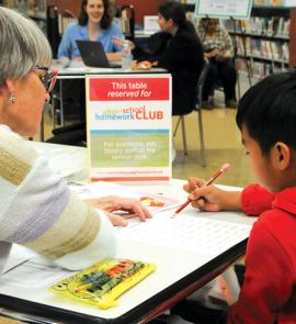 homework help at the library with child and tutor